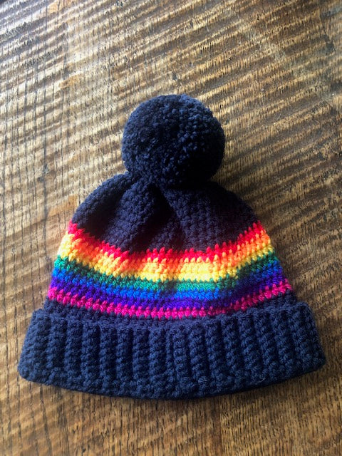 Knitted Pom Pom Hat - Navy Rainbow